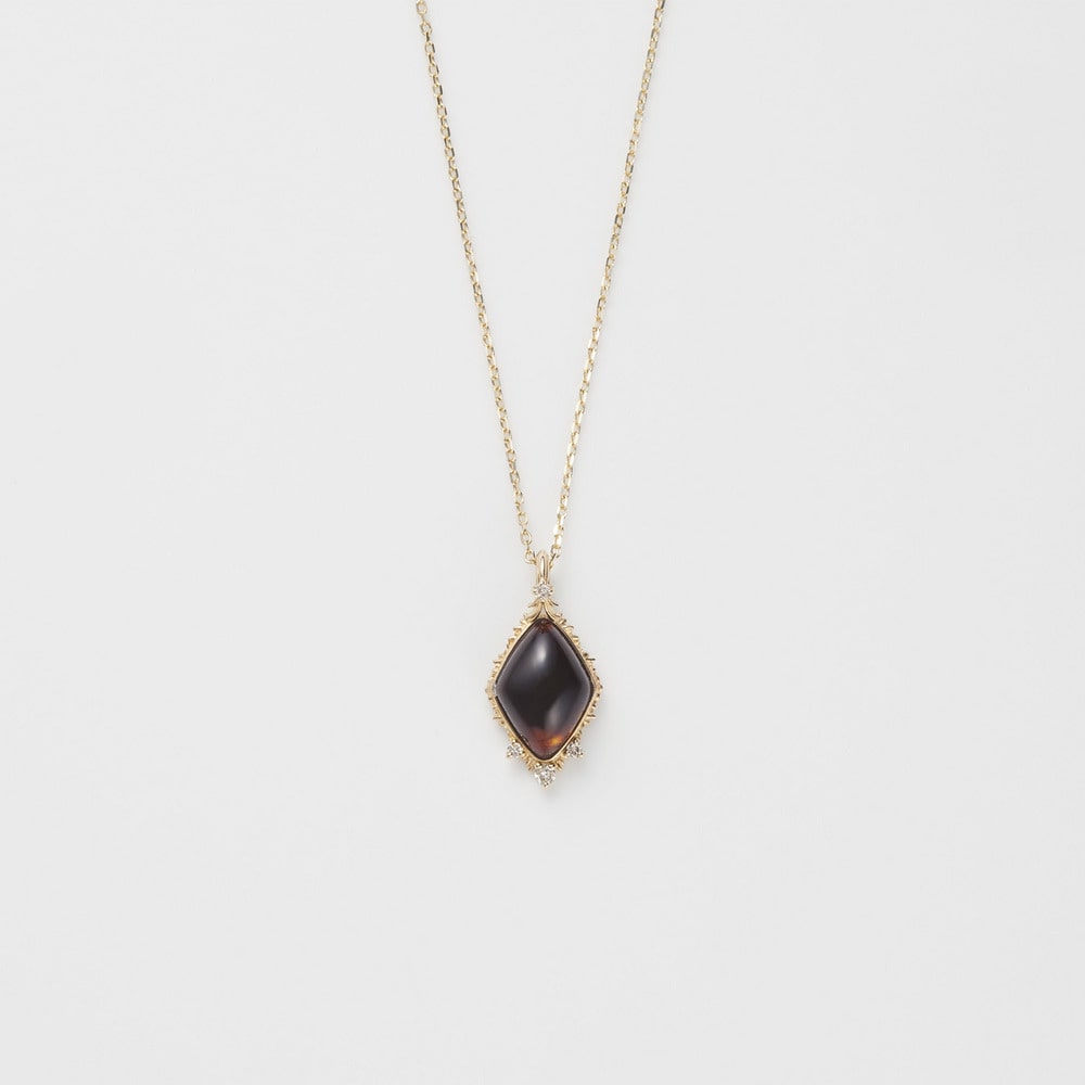K10 Amber Charm