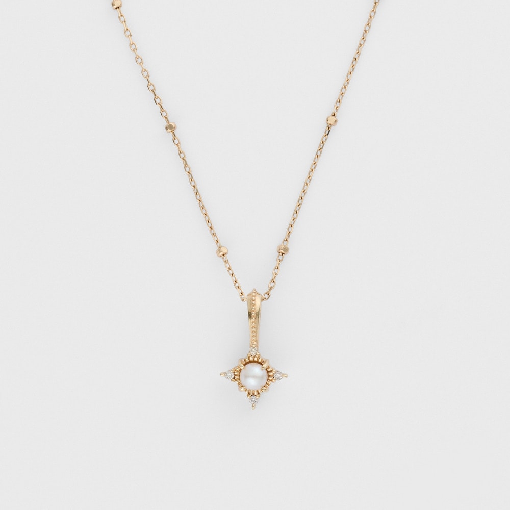 K10 Pearl Charm